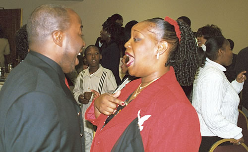 Michael and Saderia participating in exercise, Los Angeles, California Black Business Seminar