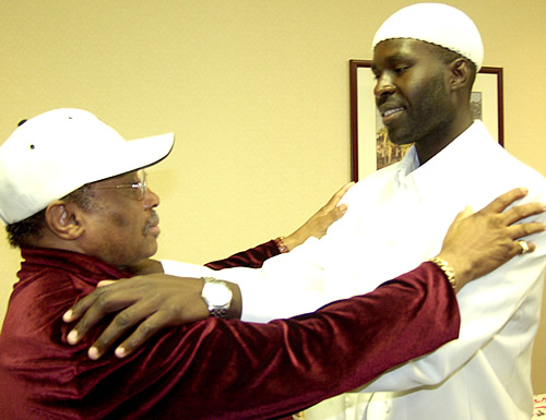 Brothers participating in exercise, Los Angeles, California Black Business Seminar