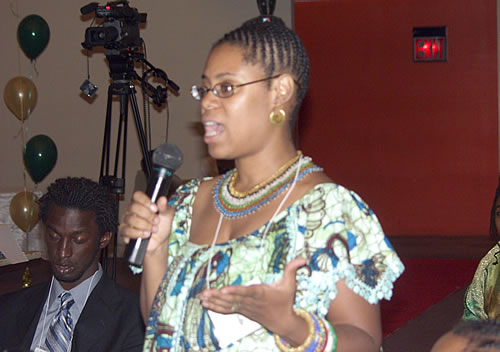 Sister telling audience about her company, New York City Black Business Seminar