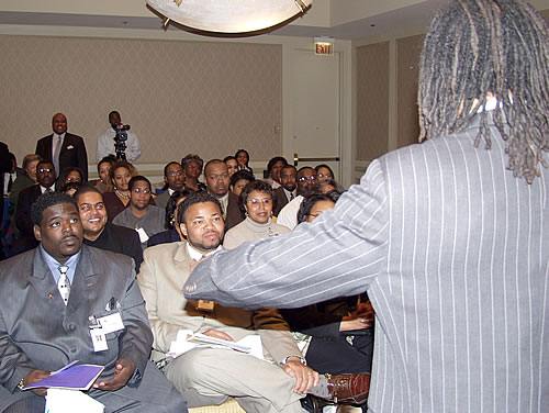 Erroll speaking to audience, Detroit, Michigan Black Business Seminar