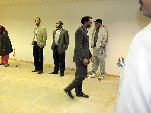 Members standing in future Production Room 1, Construction Tour of Atlanta TAG TEAM Marketing Center