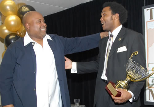 Delxino congratulates Erroll after he receives 2006 Marketer of the Year award, 2007 TAG Awards Show