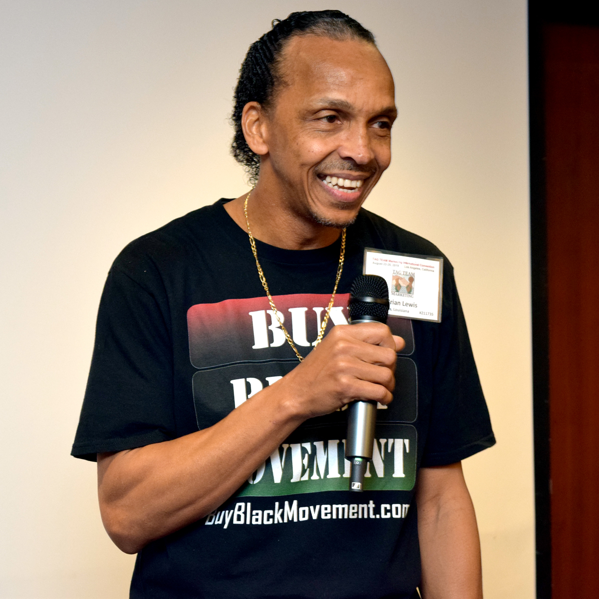 Chezyown Menasheh speaking to audience, 2020 TAG TEAM Marketer Training Camp