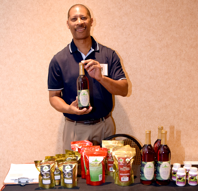 David Grissett displaying Shepherd's Harvest products