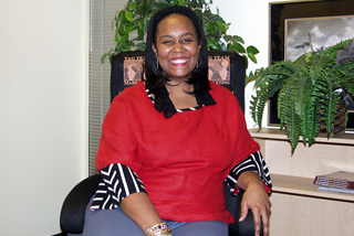 Debbie in office at TAG TEAM Marketing Headquarters