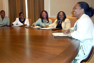 Debbie speaking to Sisters around conference table