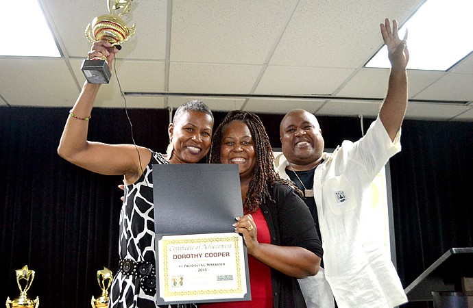 Dorothy Holding Trophy With Debbie and Delxino Dorothy Holding Trophy With Debbie and Delxino