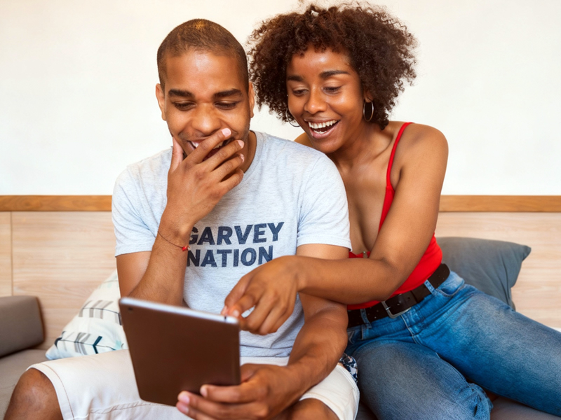 Black couple participating online