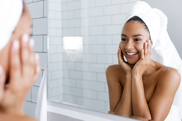 Sister Apply Skincare Products To Her Face