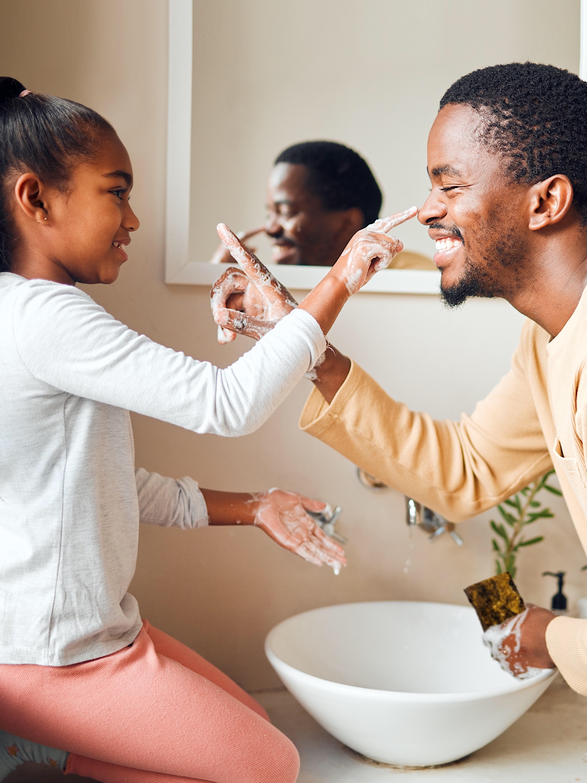 Black Daughter and Father - Soap Finger On Nose