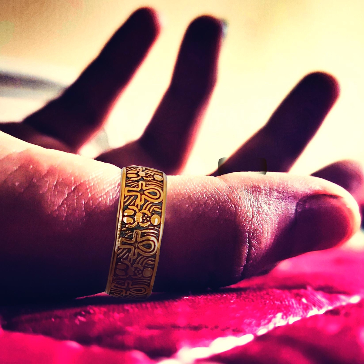 Hand wearing ring