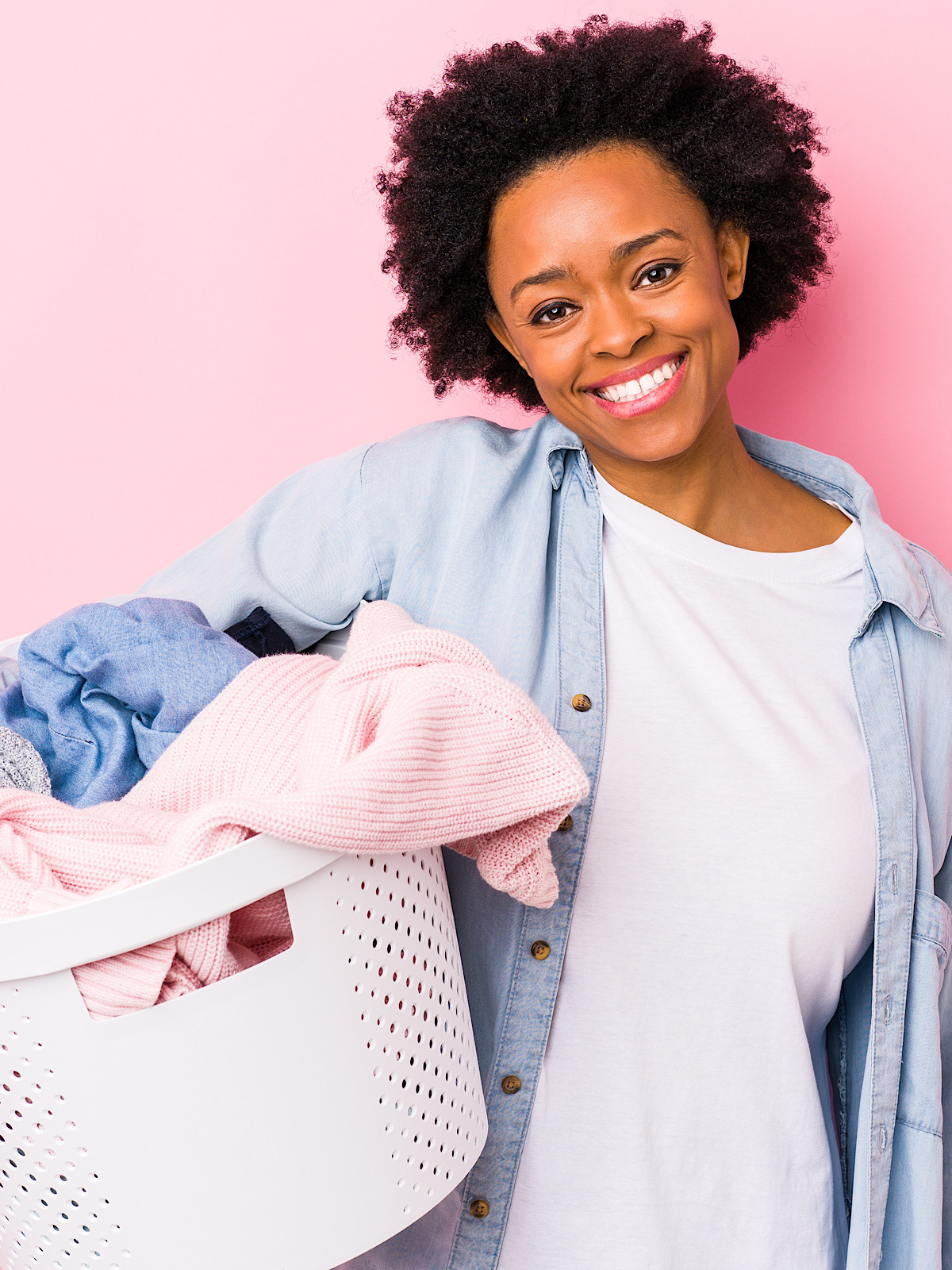 Sister Smiling Holding Laundry Basket