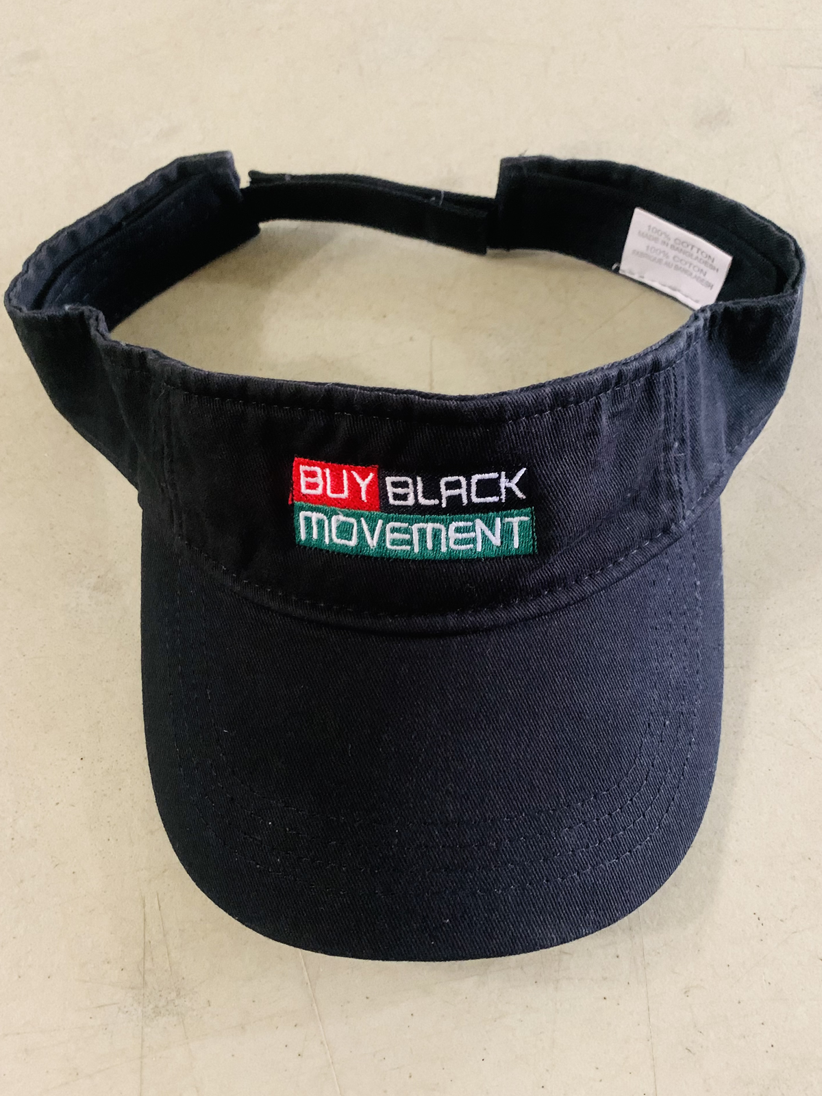 Buy Black Movement Embroidered Visor On Table - No Border